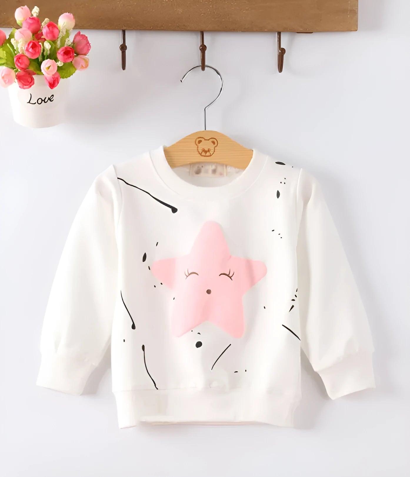 Korean style baby girl's cartoon pattern autumn sweater in soft treated fabric.
