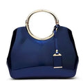 Structured polyester women's handbag in various colours with card slot and zipper pocket interior