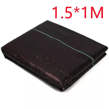 Black composite woven PE weed-proof cloth roll for farmland and greenhouse use.