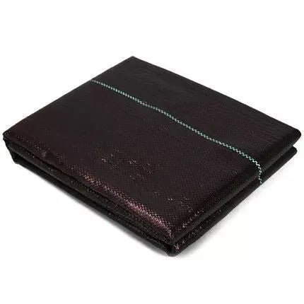 Black composite woven PE weed-proof cloth roll for farmland and greenhouse use.