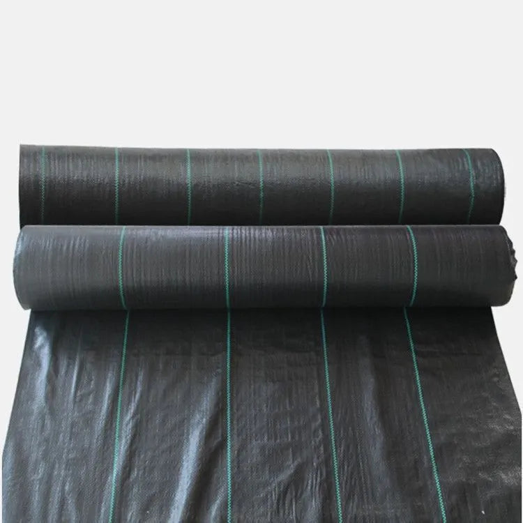 Black composite woven PE weed-proof cloth roll for farmland and greenhouse use.