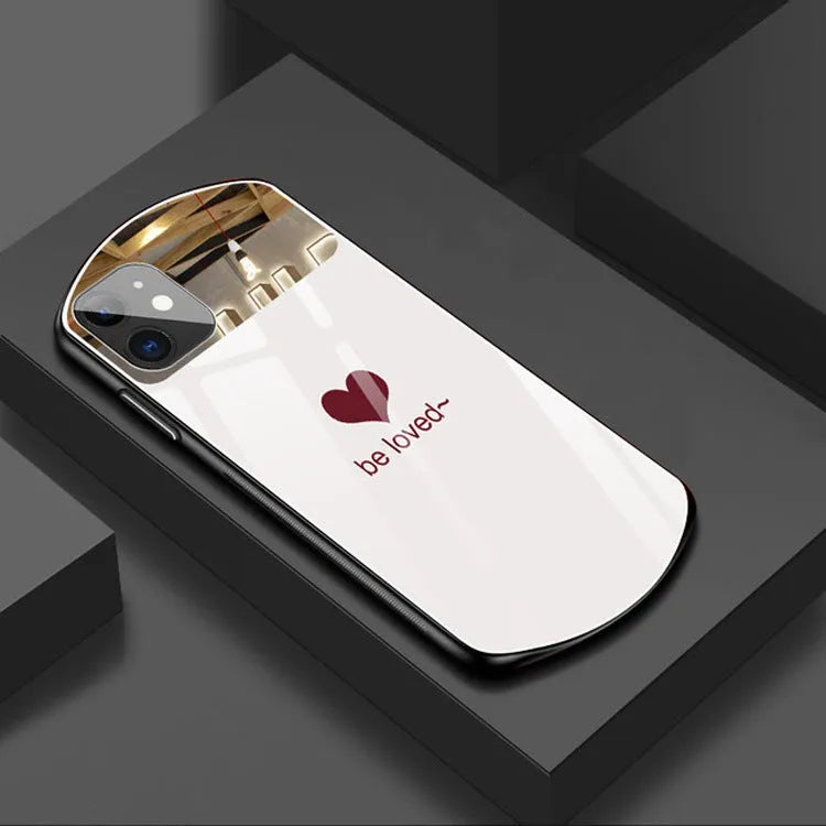 iPhone case with mirror and painted love letter design in wine red colour
