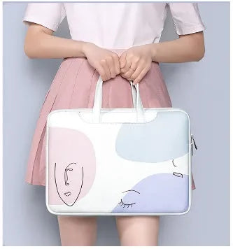 Blue waterproof laptop bag for 15.6 inch devices with zippered closure and soft handle