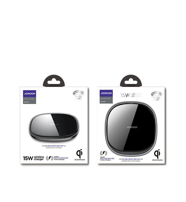 Black circular 15W wireless charging pad with a glass top and zinc alloy rim on a desk.