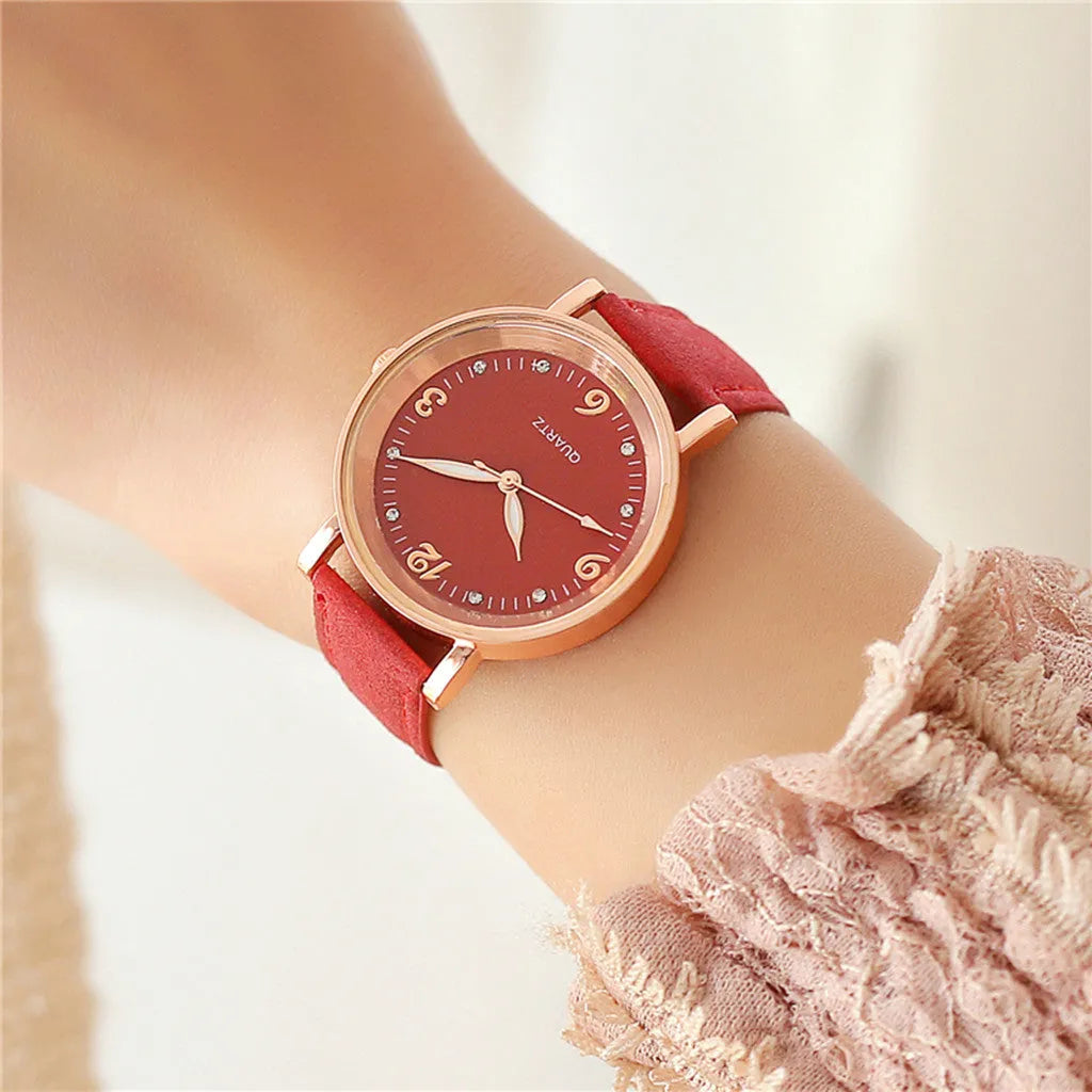 Luminous women's quartz watch with 36mm alloy case, glass dial, and brown leather strap