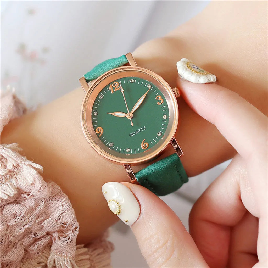 Luminous women's quartz watch with 36mm alloy case, glass dial, and brown leather strap