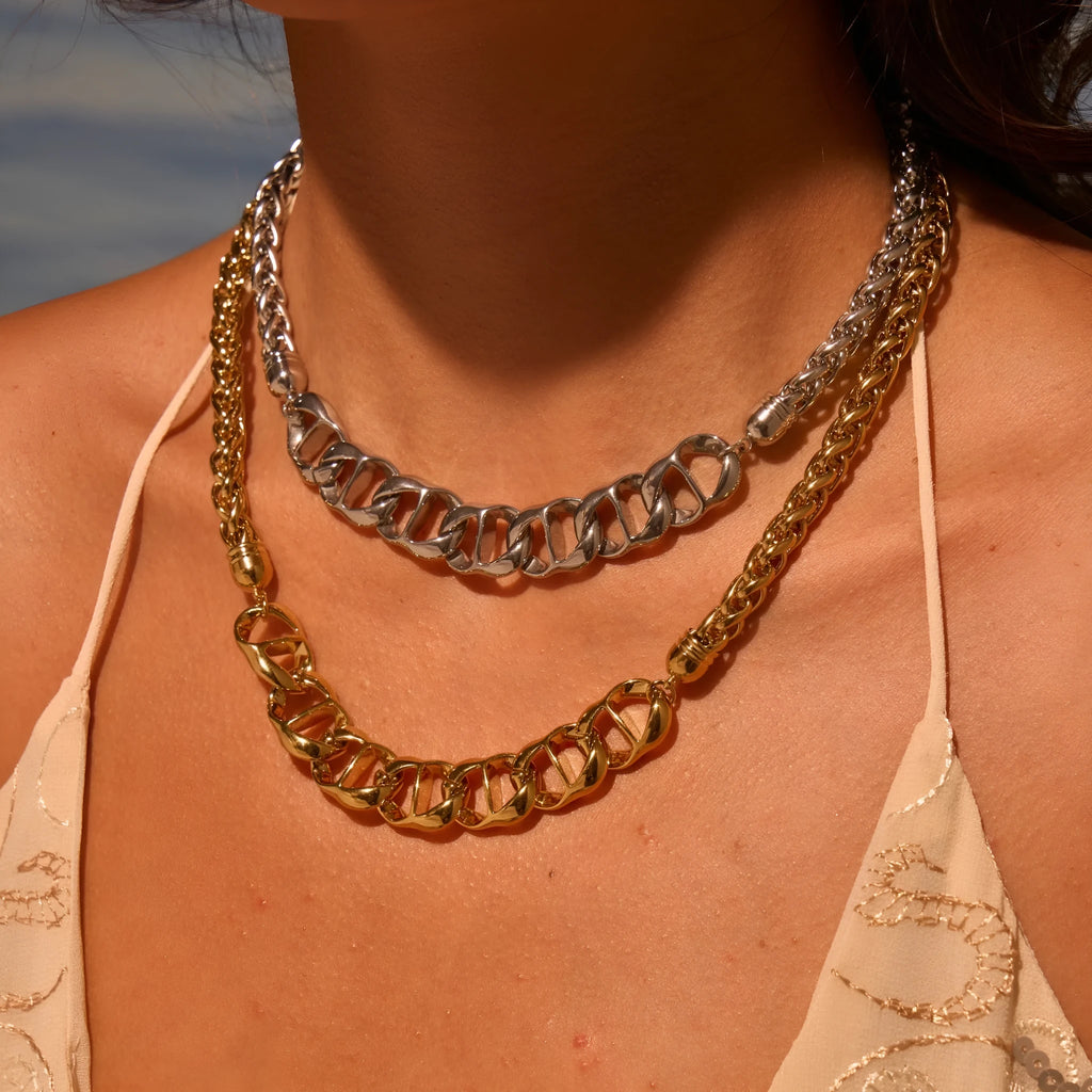 Stainless steel necklace with geometric pendant and 18K gold plating in gold or steel colour options