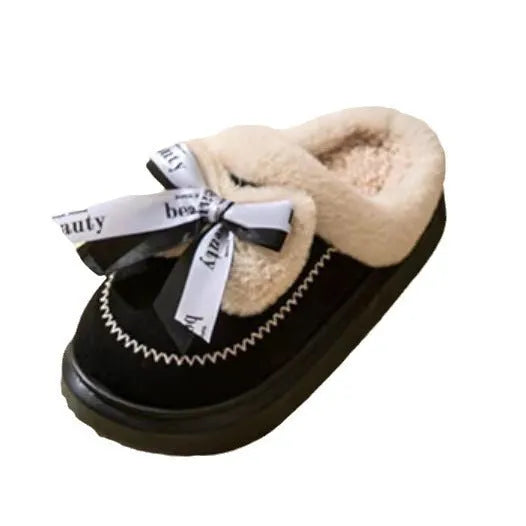 Women's beige suede half slippers with a black ribbon bow and thick white EVA sole