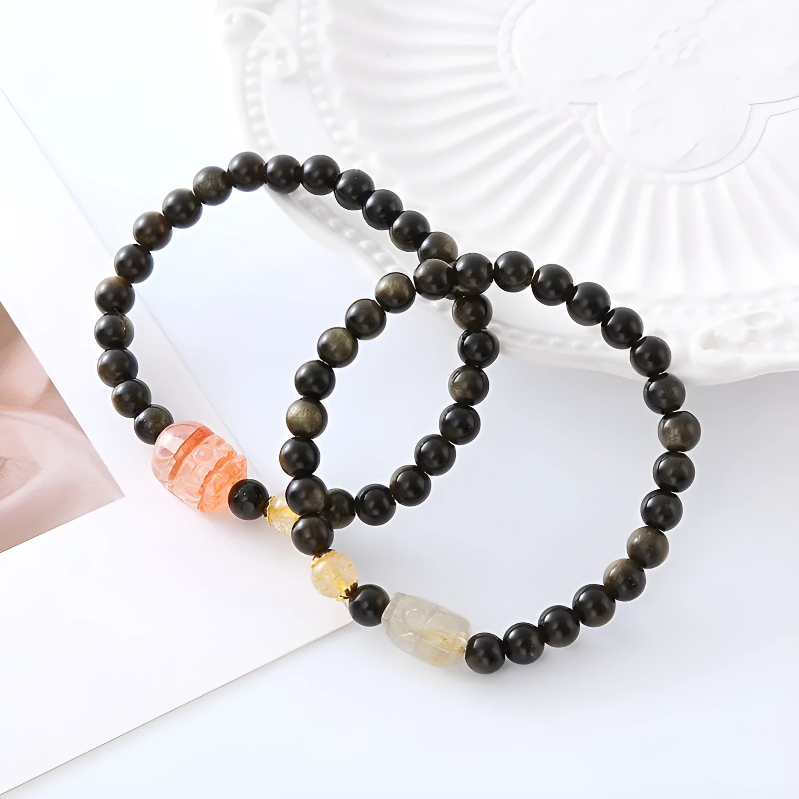 Natural obsidian Pi Xiu bracelet with animal zodiac modelling in retro artistic style.