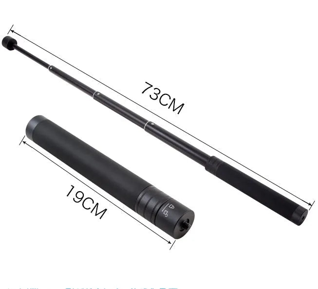 Black retractable aluminium selfie stick extended with a phone attached, showing its handheld stabiliser grip.
