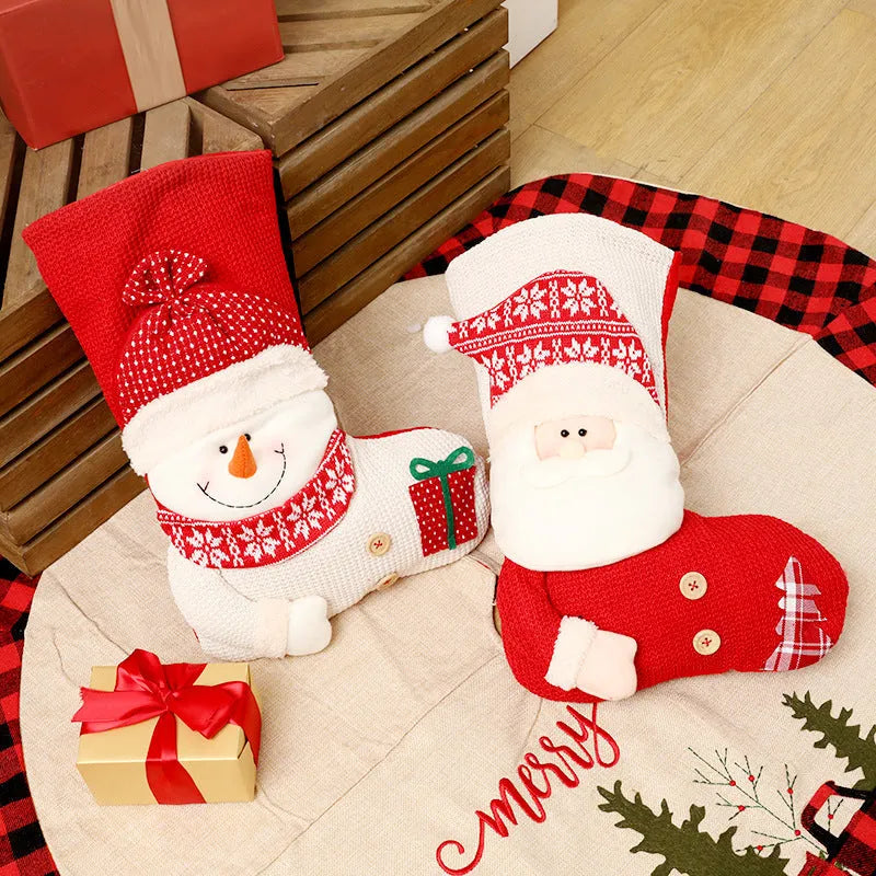 Large red white knitted Christmas stocking with Santa Claus design for fireplace decoration