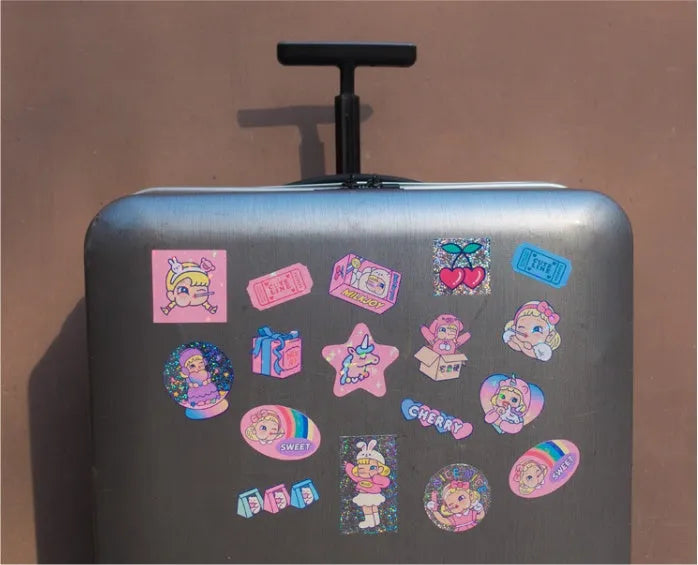 Box containing 16 cute square cartoon stickers in Korean comics style for DIY decoration.