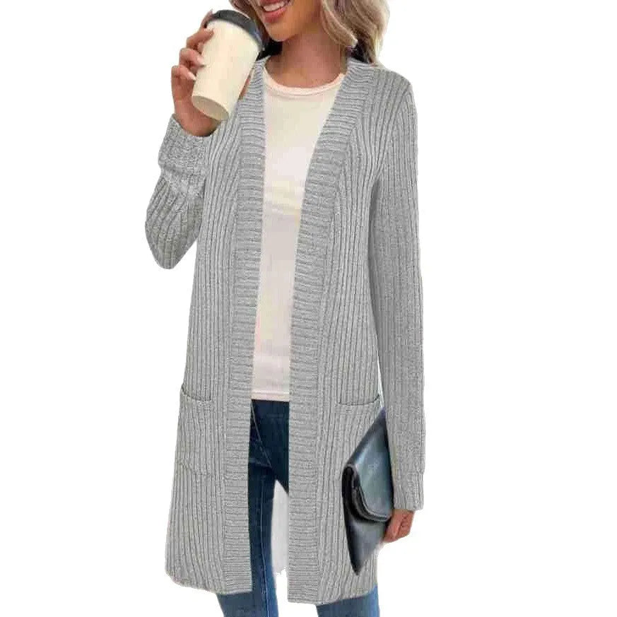 Long sleeve loose fit cardigan jacket with pockets in polyester fabric shown in black colour