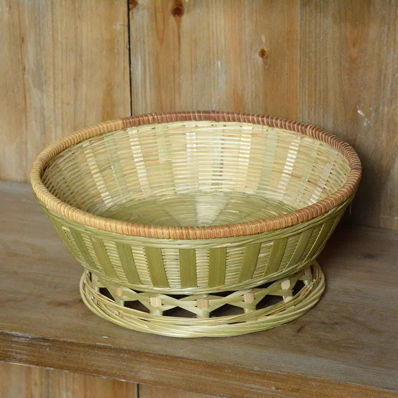 Handmade natural bamboo storage basket with open weave design in three size variations