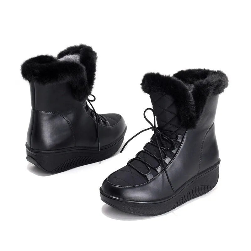 Black women's winter boots with lace-up front, platform sole, and plush lining.