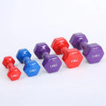A set of bright red and blue plastic fitness dumbbells with a glossy, rubber-coated surface.