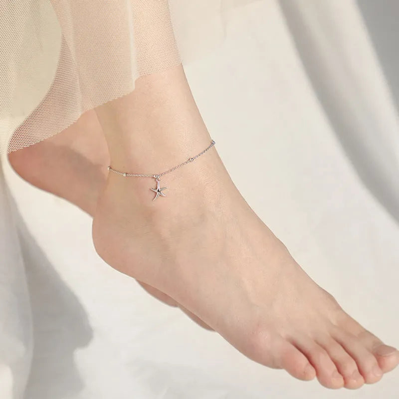S925 sterling silver anklet with a starfish charm and round beads.