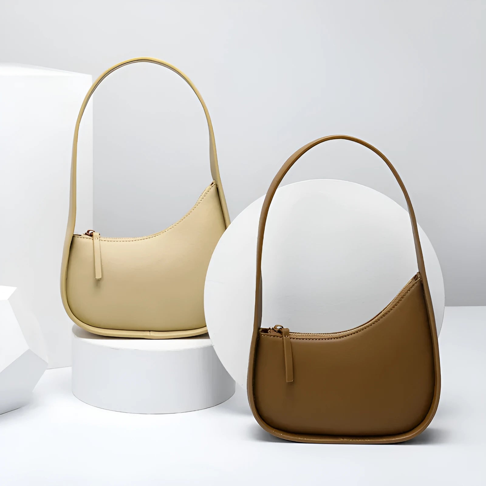Genuine leather half moon shaped women's shoulder bag with wide strap in caramel colour