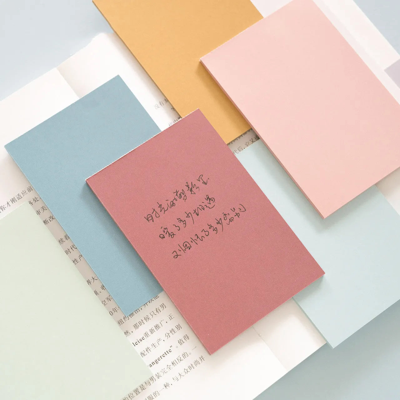 Large self-adhesive sticky notes in six colours measuring 12cm by 8cm, pack of 150 sheets for organisation