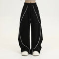 Black striped pleated hip hop wide-leg pants with mid waist and loose fit design