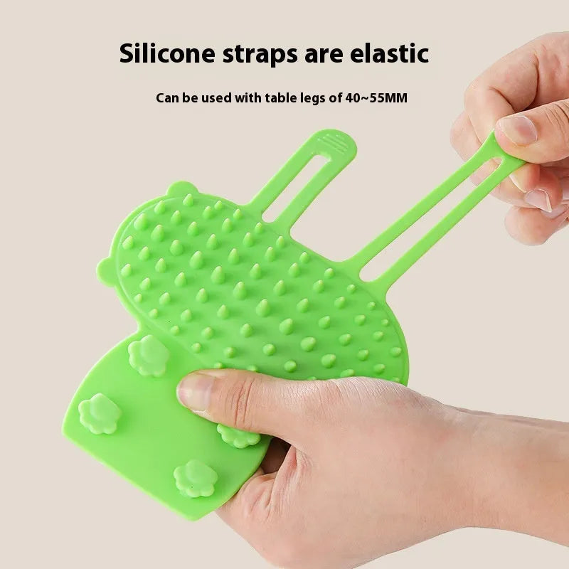 Silicone cat scratching comb with rounded teeth and adjustable strap in black, green, pink, or yellow colour.