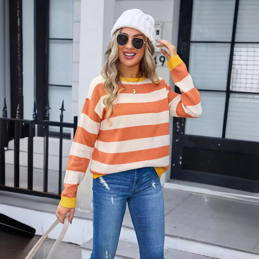 Women's loose long sleeve round neck acrylic sweater in striped or plaid pattern