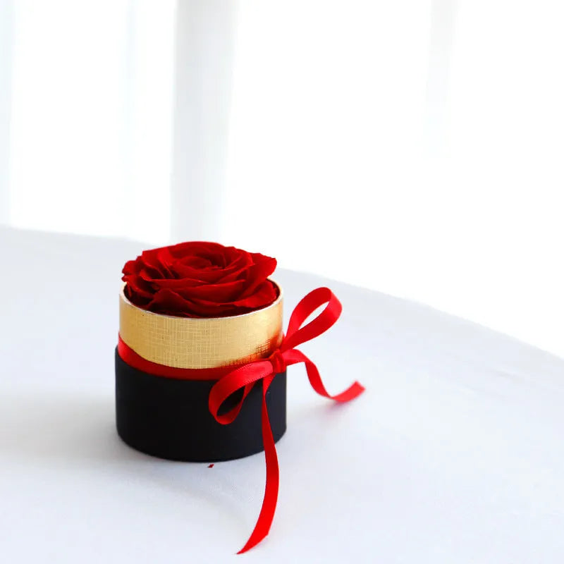 Boxed set of preserved red eternal roses in a luxury gift box for Valentine's Day.