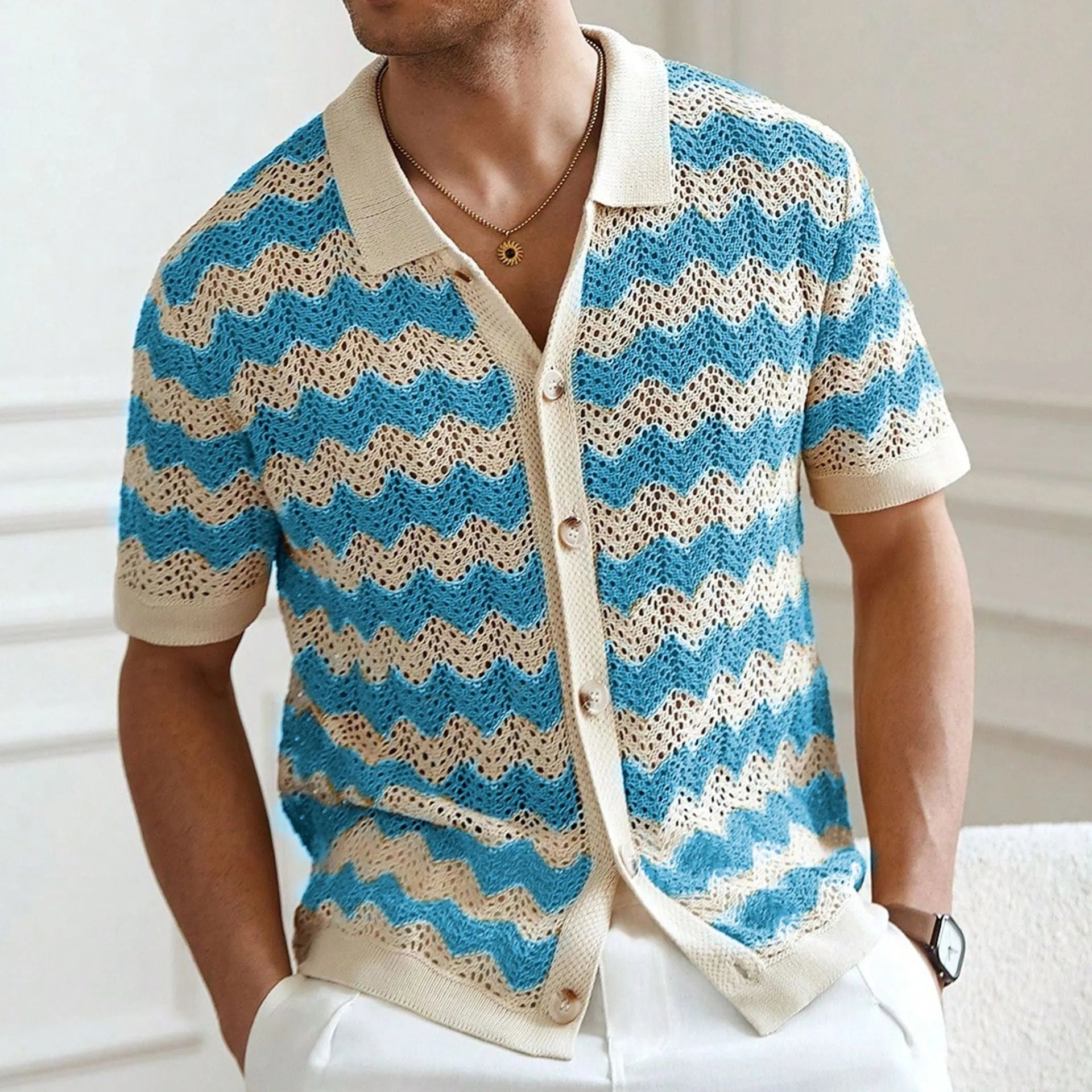 Short sleeve corrugated knit sweater in blue, brown, or yellow, showing textured jacquard pattern.