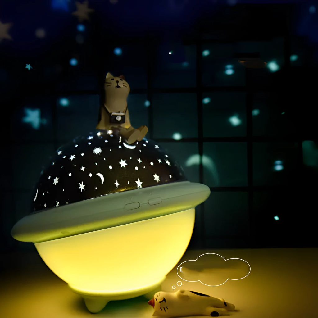 UFO-shaped starry sky projection night light in pink colour showing star projection effect