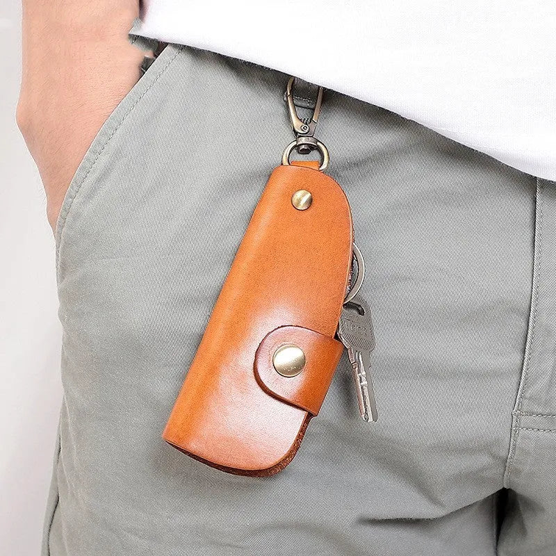 Genuine leather handmade key storage bag for car keys in black, brown, coffee, and purplish red.