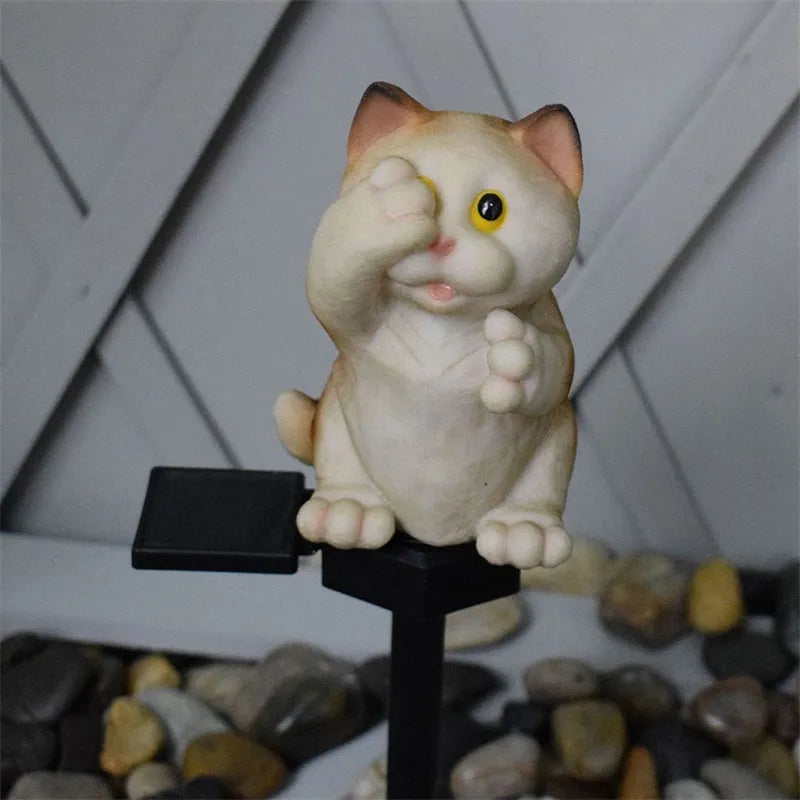 Brown or grey resin cat-shaped solar lawn light for garden and courtyard decoration.