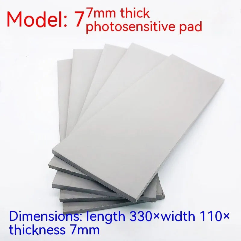 Black and grey photosensitive rubber sheet for seal making, showing 330mm by 110mm size.