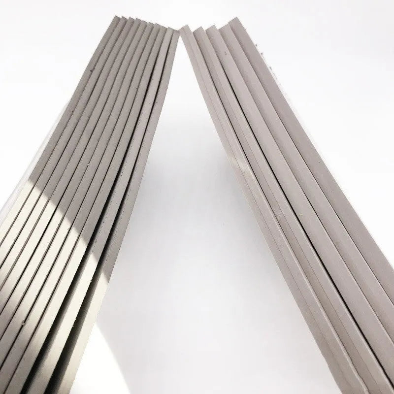Black and grey photosensitive rubber sheet for seal making, showing 330mm by 110mm size.