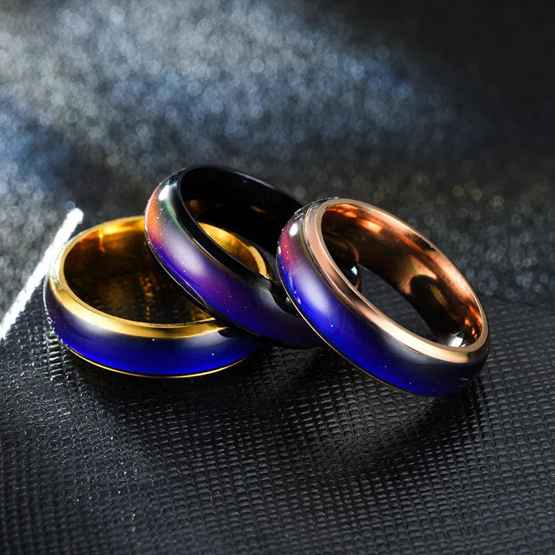 Colour changing mood ring in alloy with temperature-sensitive coating, available in black, gold, multicolor, rose gold, silver