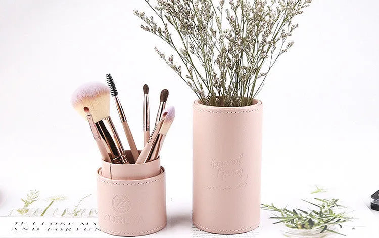 Daily makeup brush set with artificial fibre bristles and aluminium handles in black, brown, and pink