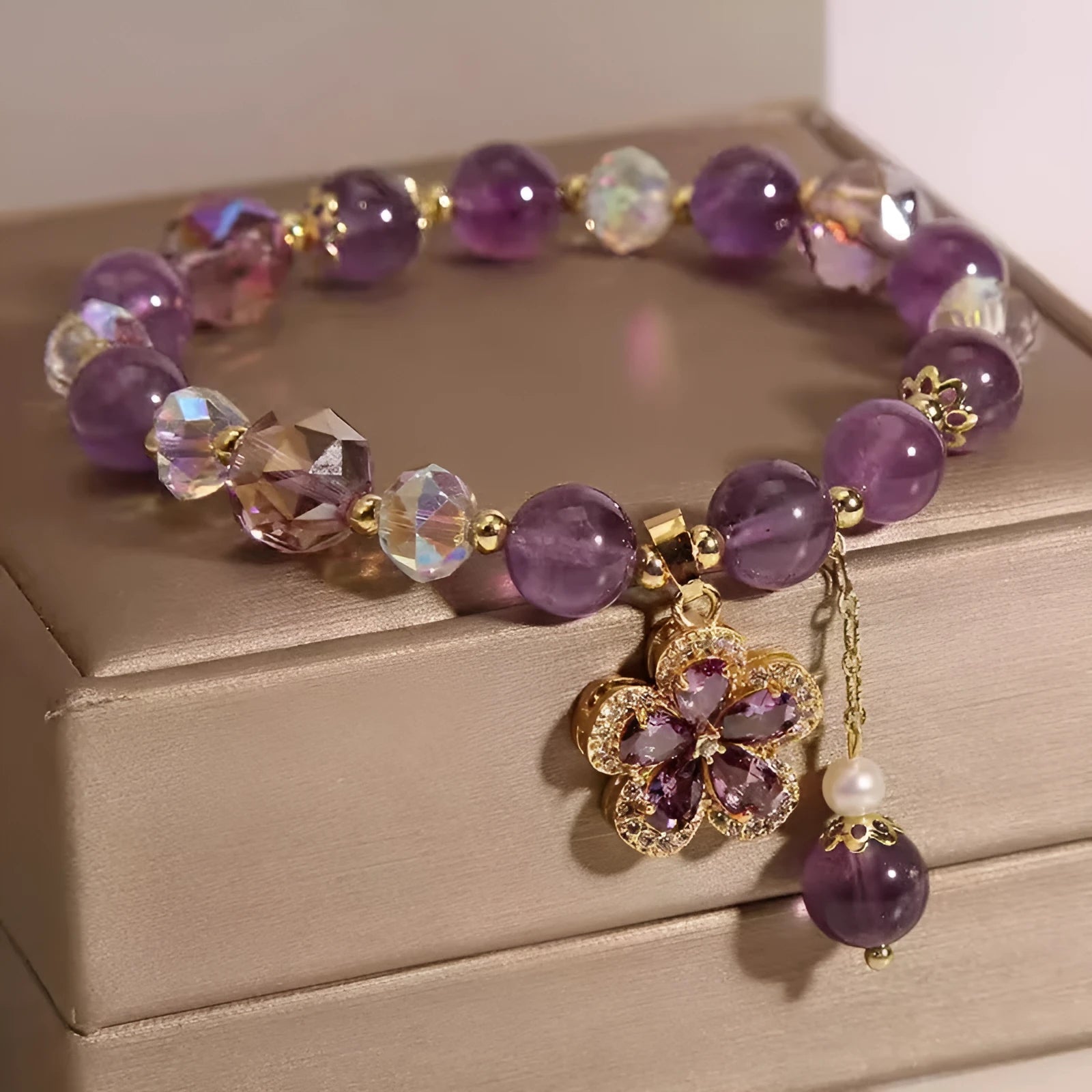 Women's antique style crystal bracelet with purple amethyst fox pendant and five-leaf flower charm.