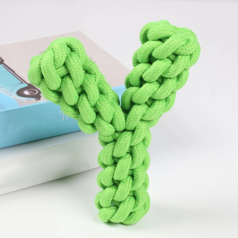 Blue Y-shaped cotton rope dog chew toy for large breeds on a wooden floor.