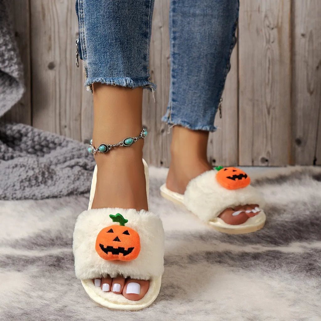 White and yellow Halloween cartoon pumpkin plush open-toe slippers on anti-slip PVC sole.