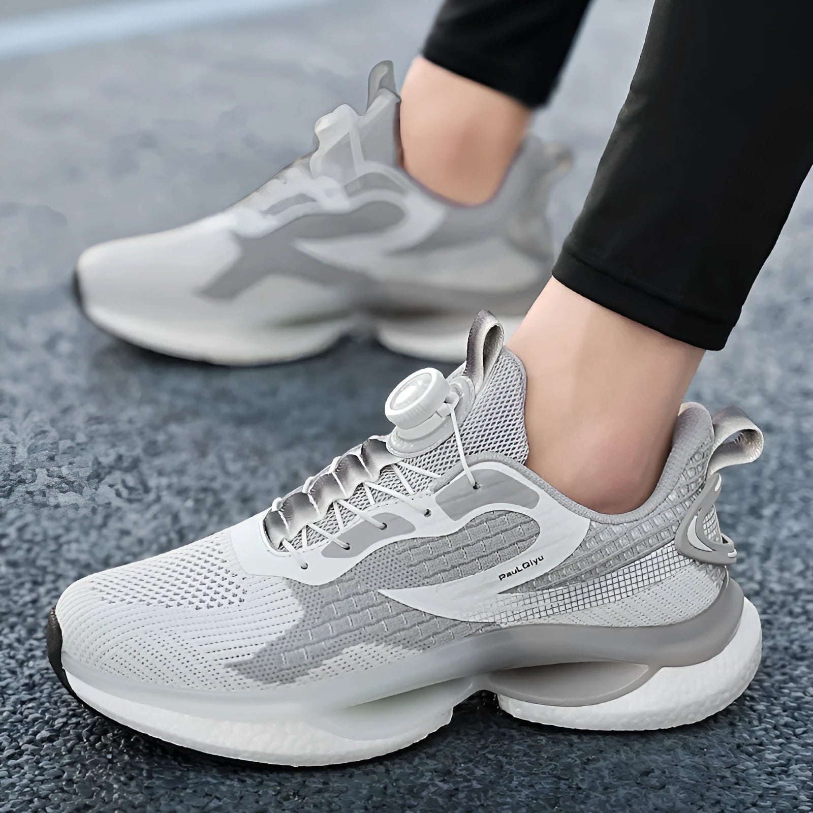 Rotating button running shoes in beige with Fly-kit mesh upper and buckle fastening