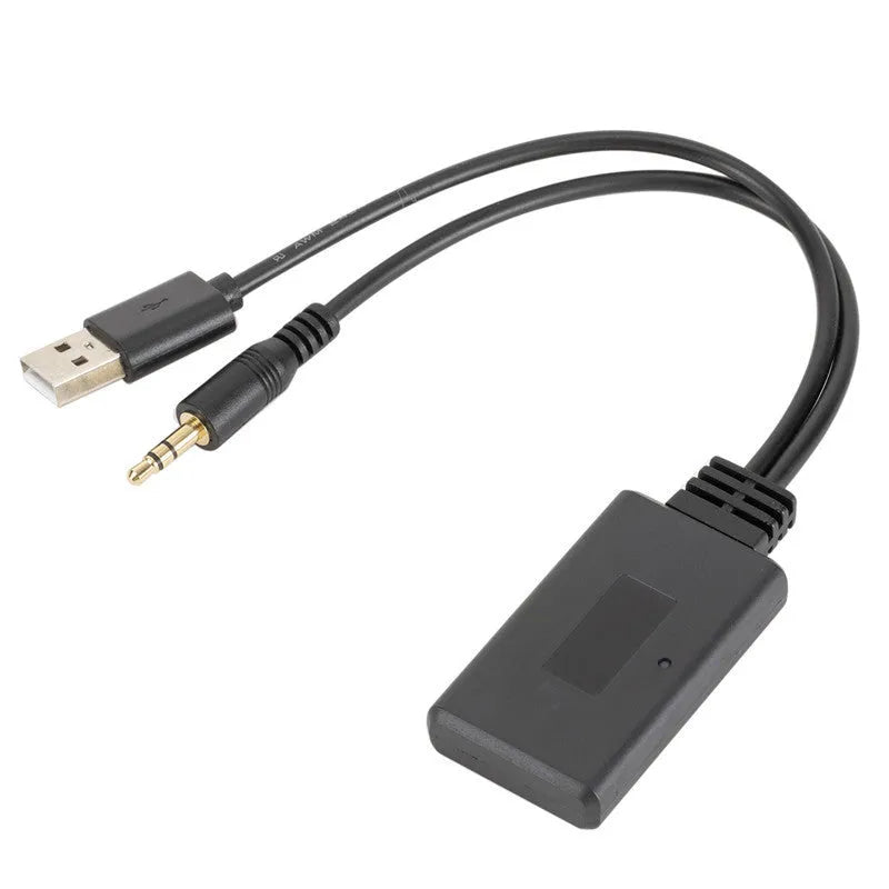 Black car AUX Bluetooth audio receiver with USB and 3.5mm output cables for wireless vehicle audio connection
