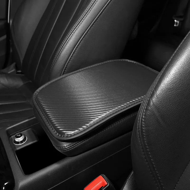 Leather car armrest box cushion mat in four colour options on a white background.
