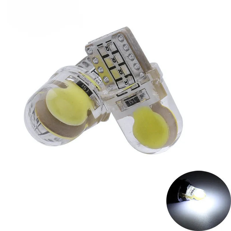 Pack of ten T10 wedge base LED bulbs for 12V car lighting in various colours on a white background.