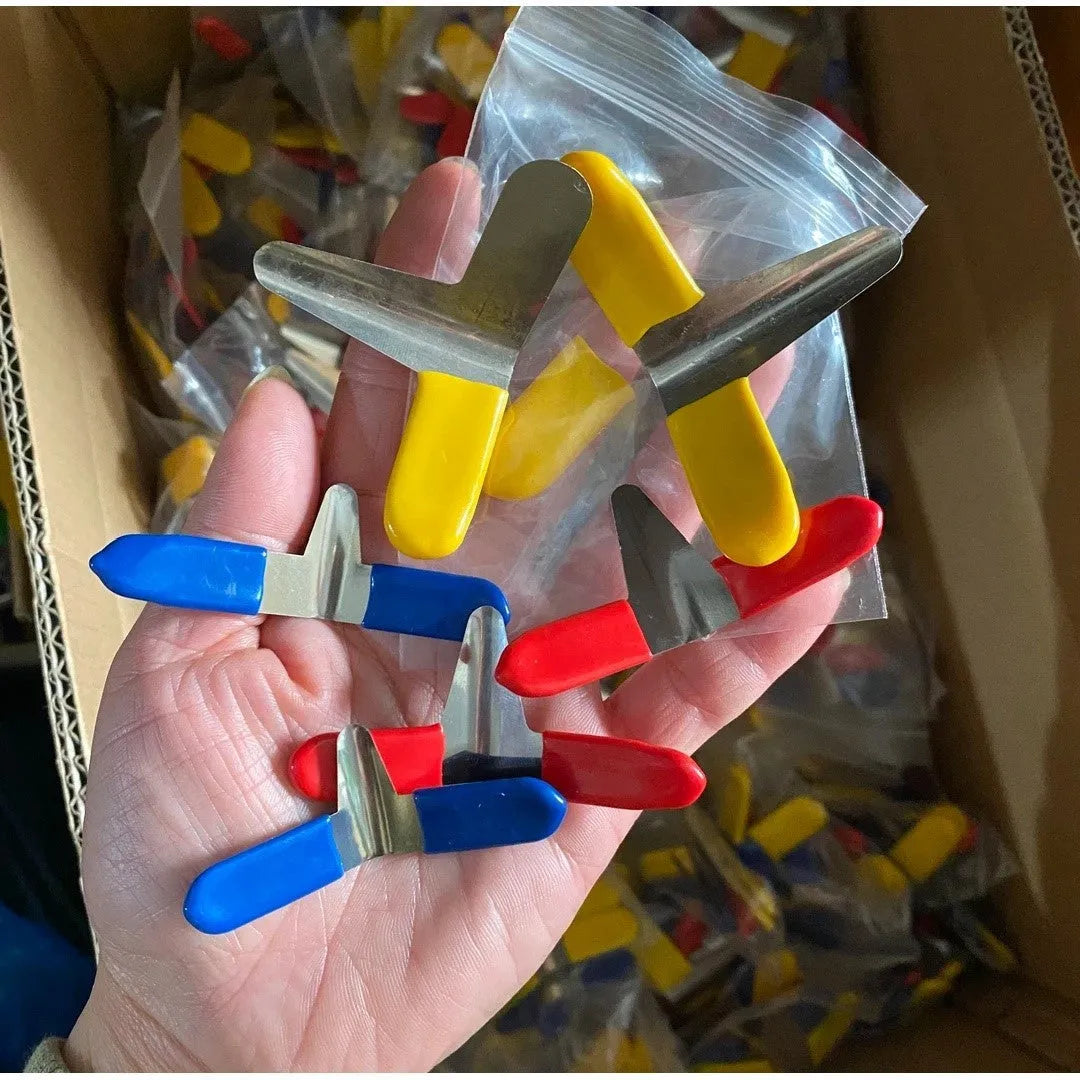 Stainless steel American-style clip locks laid out, showing the two pack options: six clips in three sizes and ten identical clips.