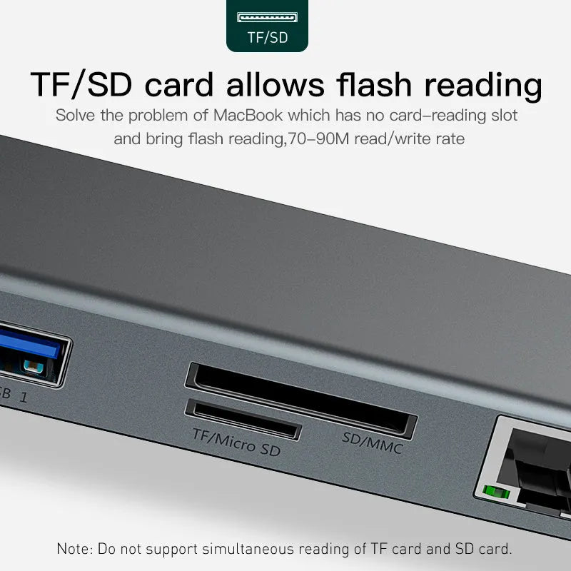 Grey aluminium ten-port docking station with cooling bracket showing HDMI, VGA, USB and network ports
