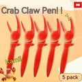 Crab-themed ballpoint pen with a pressable metal clip on a white background.