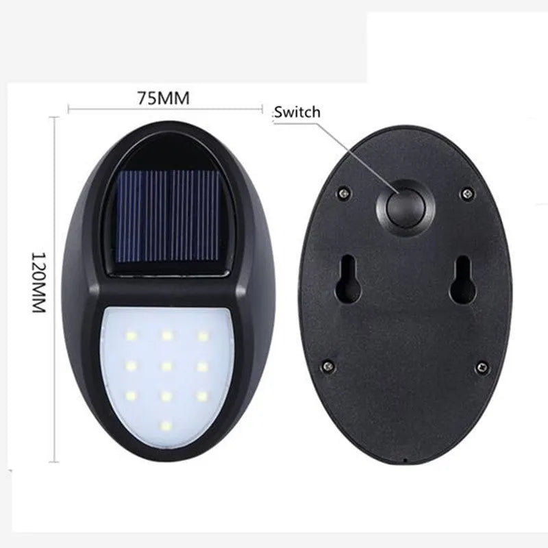 Black rectangular solar-powered LED wall light with a solar panel on top.