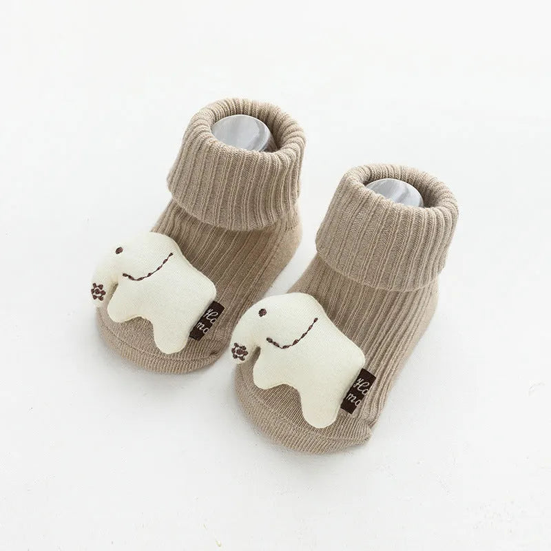 Baby socks with anti-slip glue dots on soles in combed cotton, showing mid-tube height and various colour options