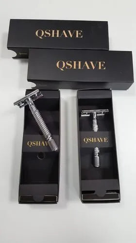 Chrome double edged safety razor with knurled brass handle and open comb head