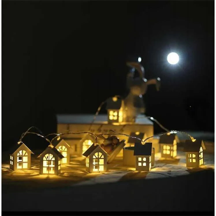 10 LED wood house fairy light string 2M with warm white glow on a Christmas tree