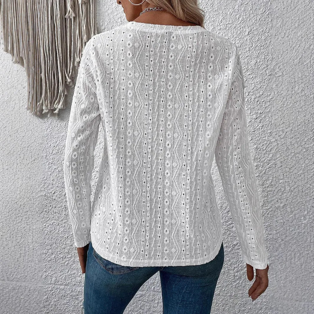 Women's white polyester top with round neck and long sleeves in loose pullover style